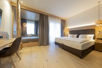 [Translate to english:] Waldnest Juniorsuite - Zimmeransicht